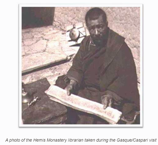 Monk holding the manuscript